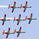 Illustration for article titled Watch seven jets landing in perfect formation